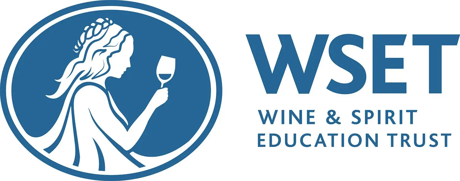 WSET illustration in blue of a woman holding a wine glass 