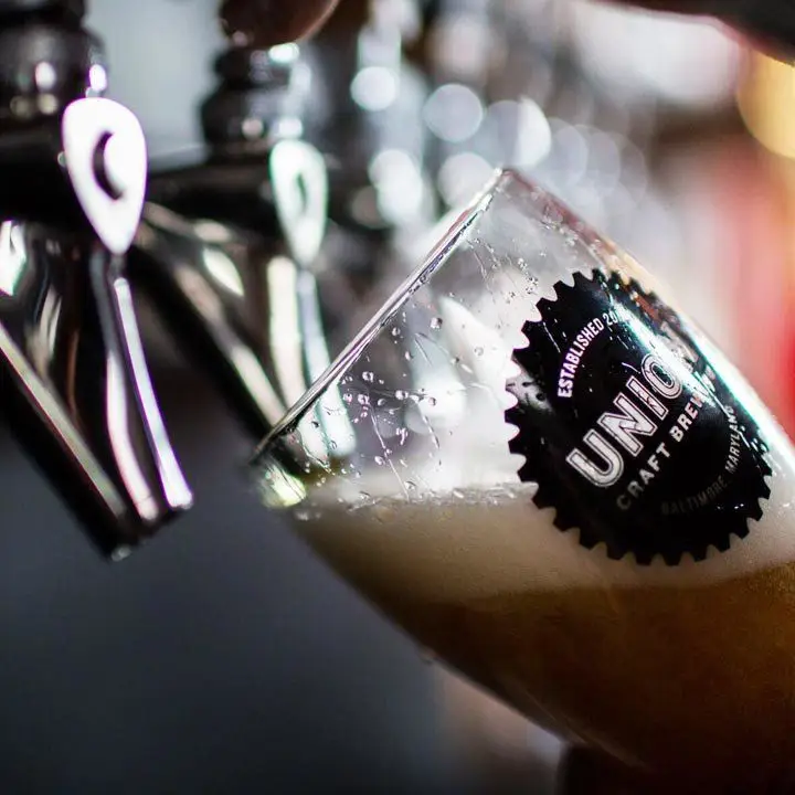 A pint being poured at Union Craft Brewing in Baltimore