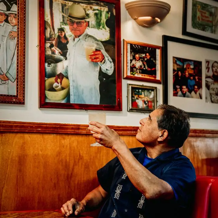 Julio Bermejo toasting portrait of his father at Tommy