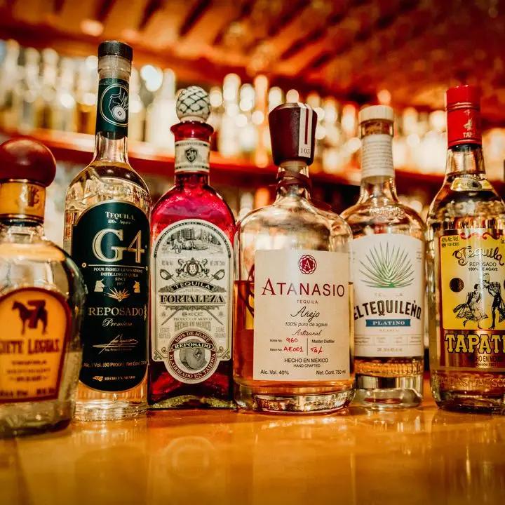 Tequila bottles on bar of Tommy