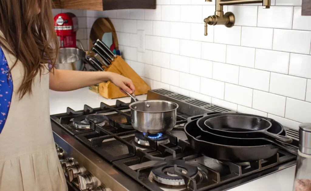Putting the pot on the stove over medium heat.' title='Blueberry Oatmeal Recipe