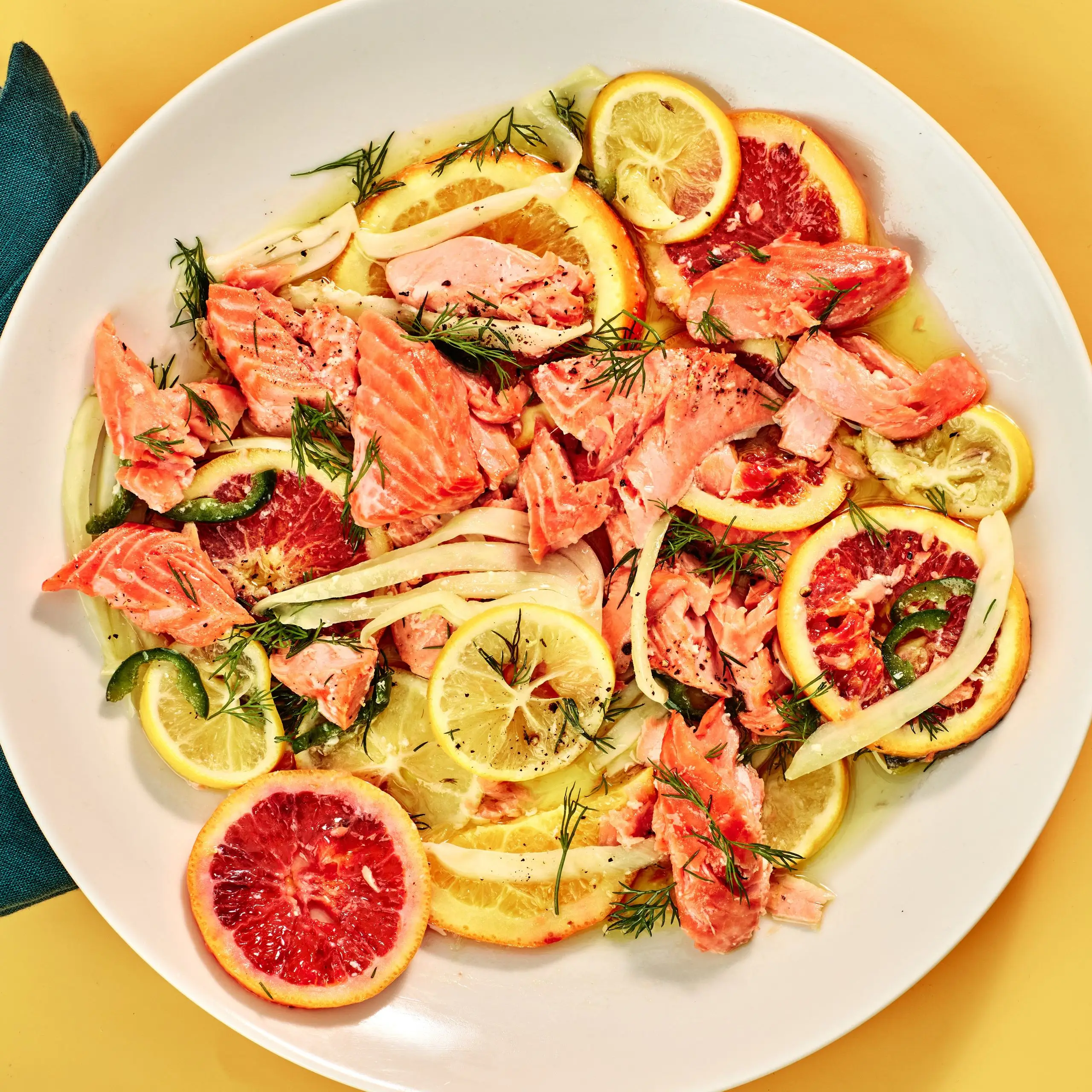 Salmon With Fennel Citrus and Chiles on a white plate