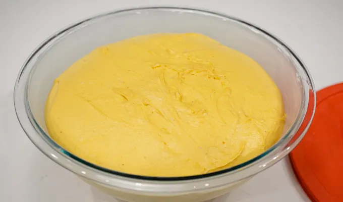 The pumpkin sourdough dinner rolls dough after the first rise.' title='Pumpkin Sourdough Dinner Rolls