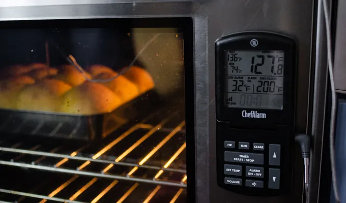 Baking the pumpkin sourdough dinner rolls with a probe thermometer.' title='Pumpkin Sourdough Dinner Rolls