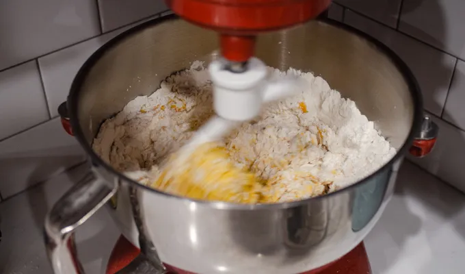 Kneading the dough with a stand mixer phase 1.' title='Pumpkin Sourdough Dinner Rolls