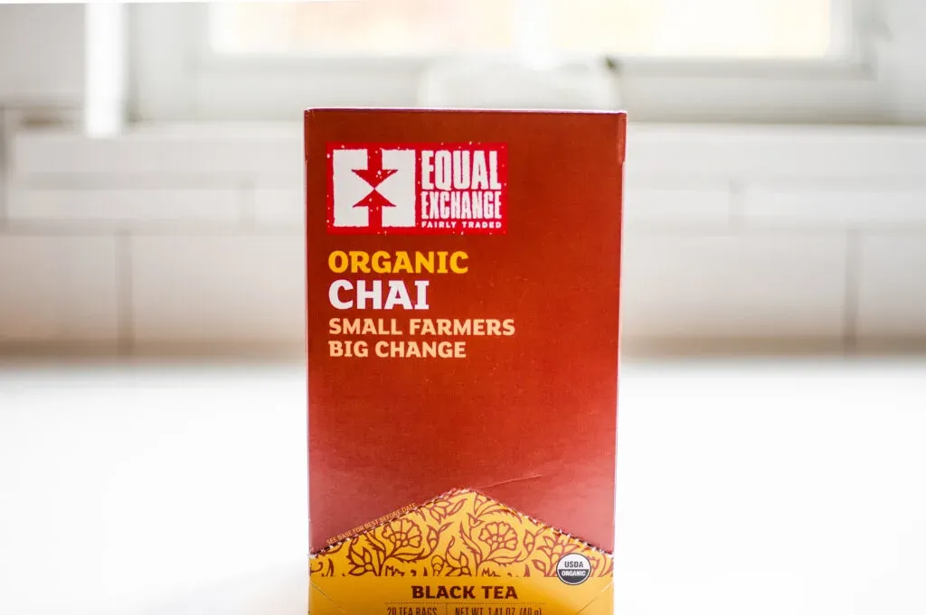 Equal Exchange organic chai tea on a white countertop.' title='Best Organic Chai Tea