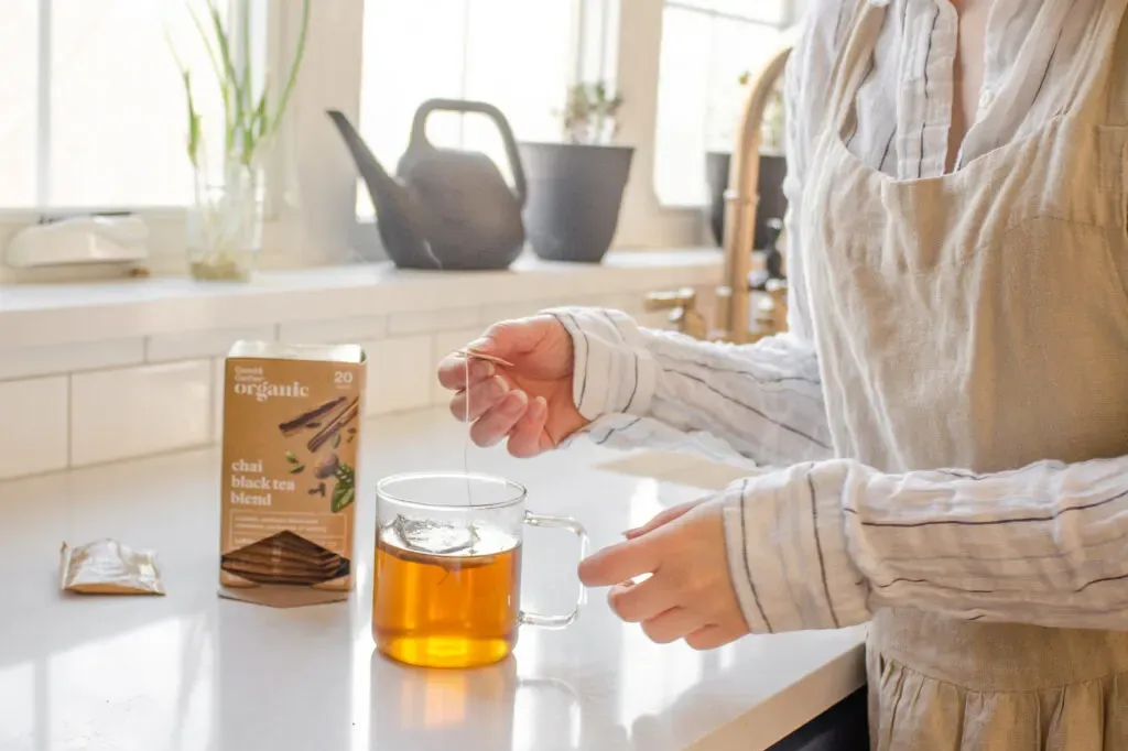 Brewing a cup of chai tea with a tea bag. ' title='Best Organic Chai Tea