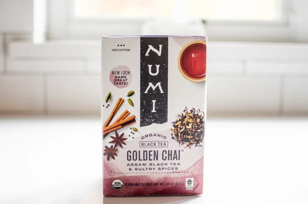 A box of Numi Golden Chai on a white countertop.' title='Best Organic Chai Tea