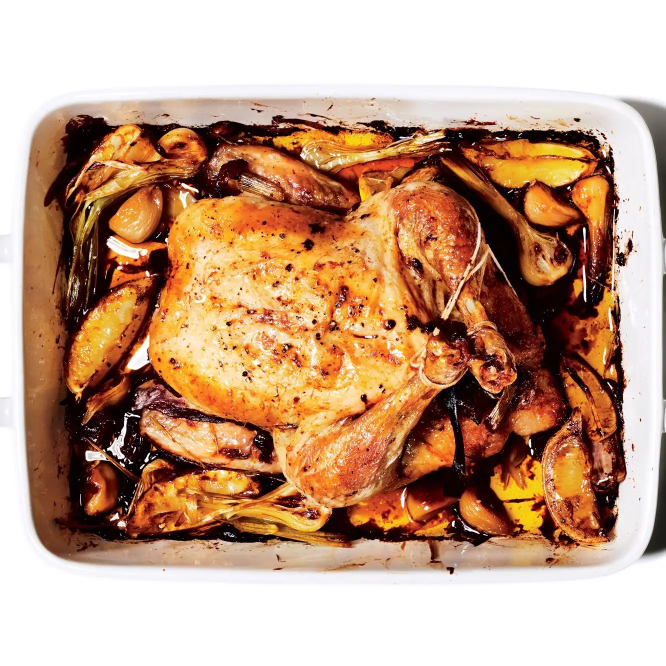 Frango assado lento com todo o alho