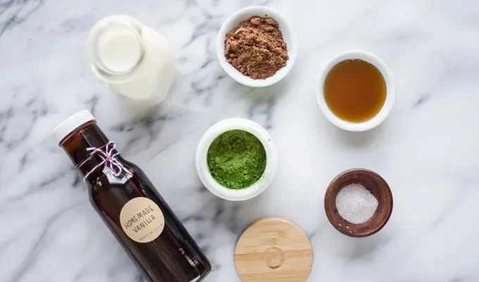 Ingredients for making a chocolate matcha latte.' title='Matcha Cocoa