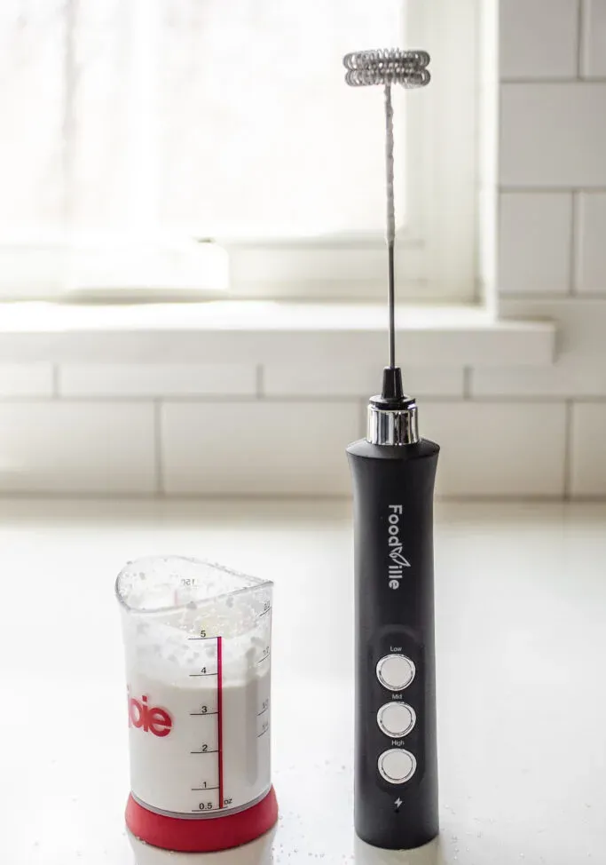 Whipping cream with a hand held milk frother.' title='Double Chocolate Chip Frappuccino Recipe 