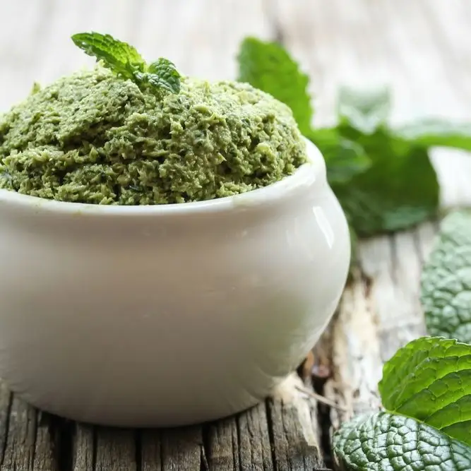 Image may contain Vase Potted Plant Plant Pottery Jar Planter Herbs Mint Herbal Ice Cream Cream Food and Dessert