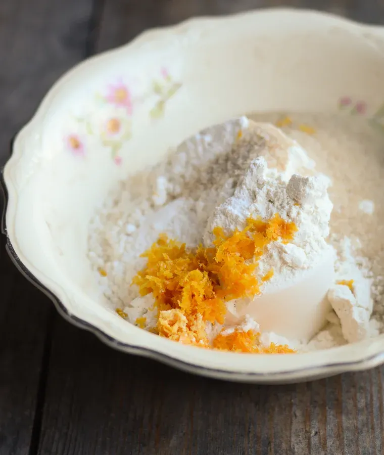 All of the dry ingredients in a large mixing bowl.' title='Orange Scones