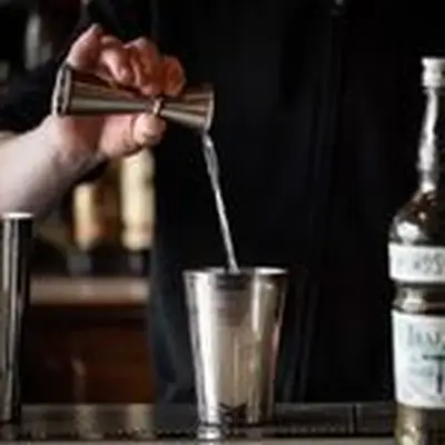 Mixing a cocktail with Fords Officers’ Reserve, a 109-proof navy-strength gin