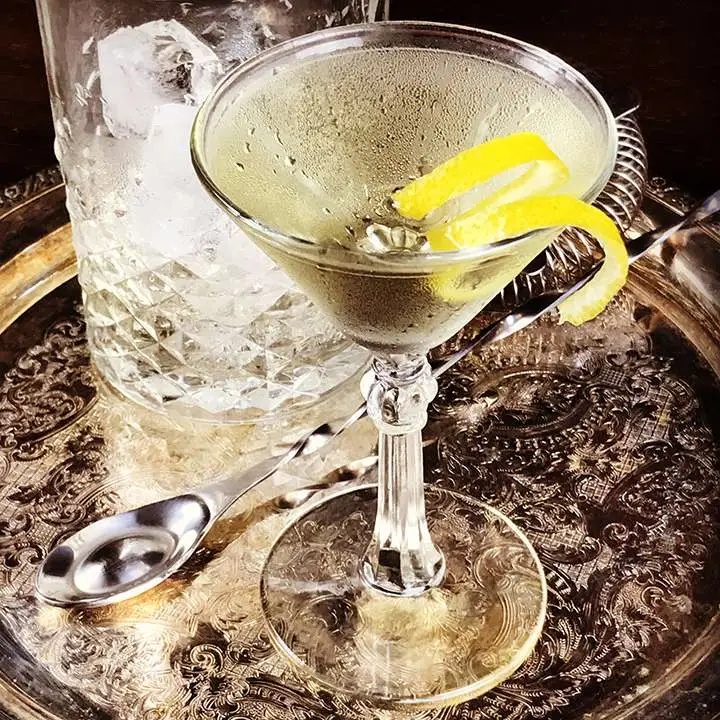 Smoky Martini cocktail garnished with lemon twist