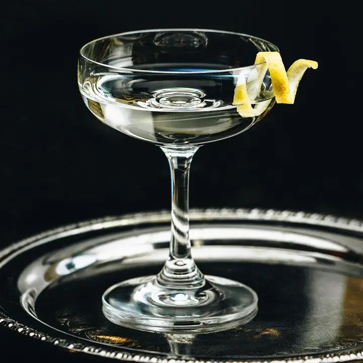 Vesper cocktail with lemon twist