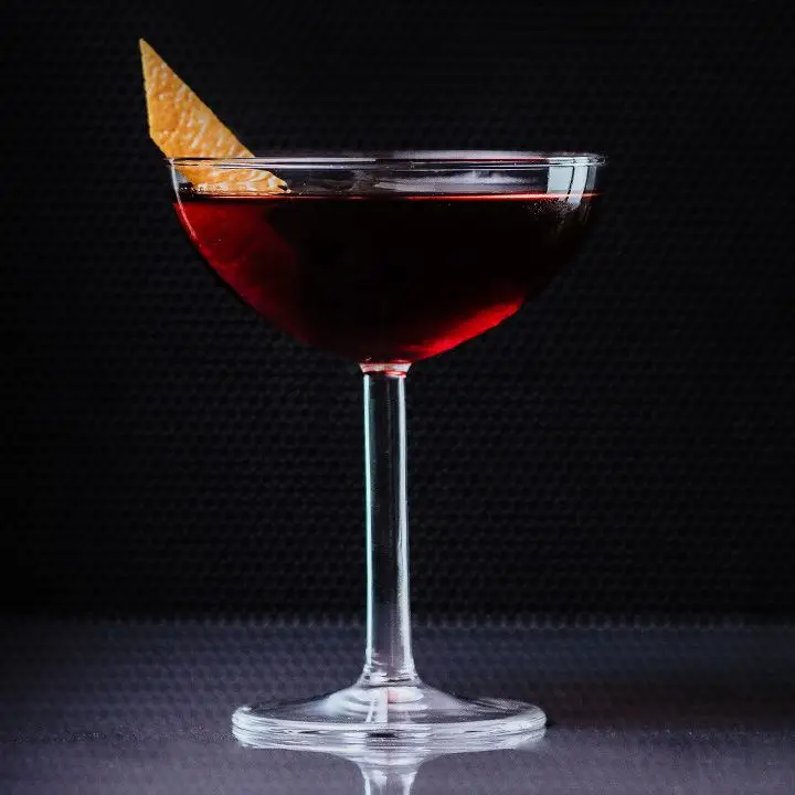 Martinez cocktail garnished with orange peel