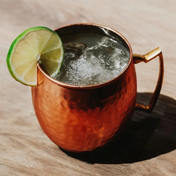 London Mule cocktail in a copper mug with a lime wheel garnish