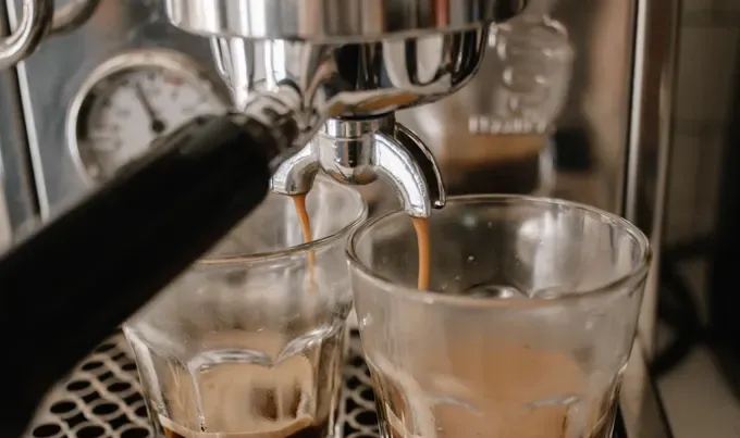 Pulling a shot of espresso with an espresso machine.' title='Sweet Cream Cold Foam Recipe