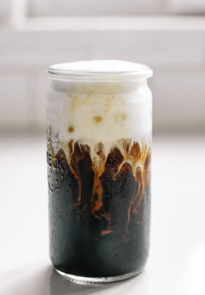 Vanilla Sweet Cream Cold Foam on top of Cold Brew at Home' title='Sweet Cream Cold Foam Recipe