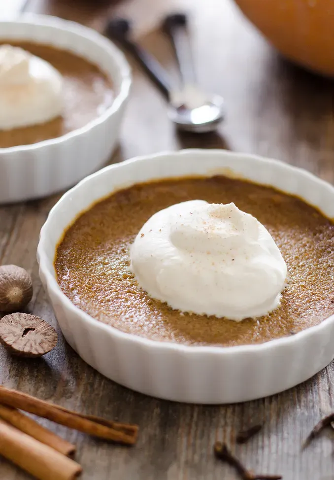 Easy Baked Pumpkin Custard | Buttered Side Up' title='Easy Baked Pumpkin Custard with Nutmeg Whipped Cream