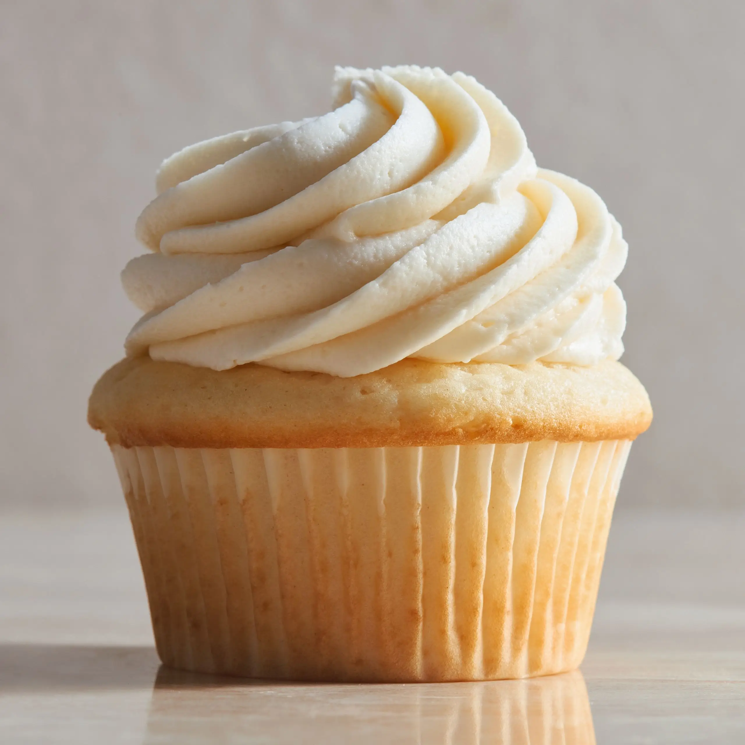 A cupcake with American Buttercream frosting.
