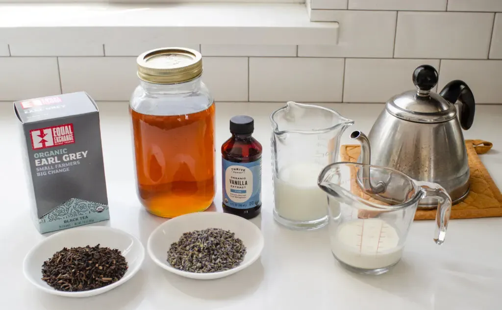 All of the ingredients needed to make an earl grey tea latte laid out on a white countertop. ' title='Homemade London Fog Tea Latte (Earl Grey Latte)