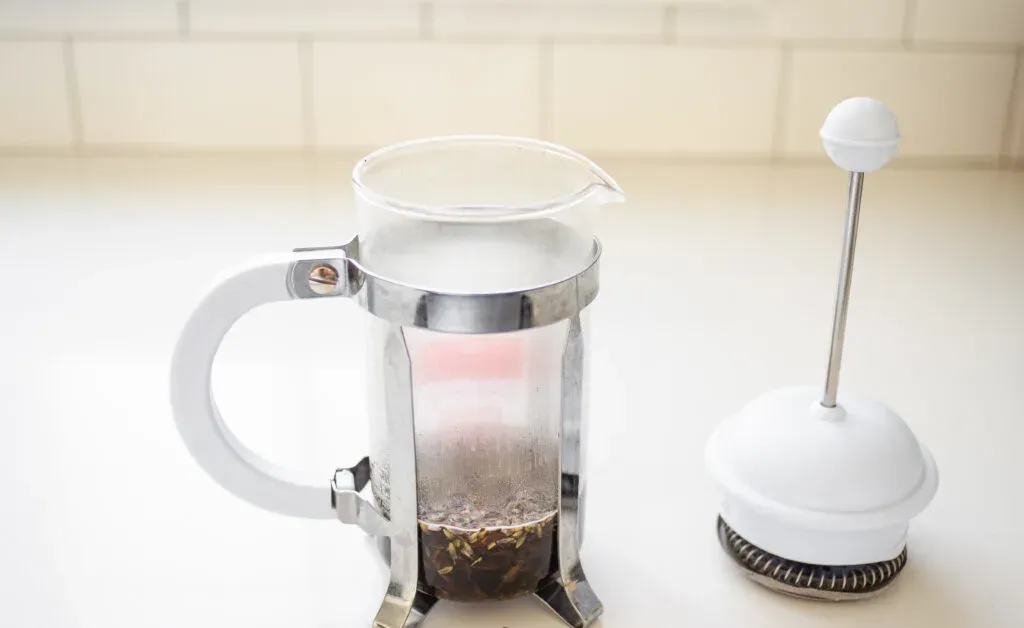 Brewing the Earl Grey tea and lavender in a French press instead of a mug.' title='Homemade London Fog Tea Latte (Earl Grey Latte)