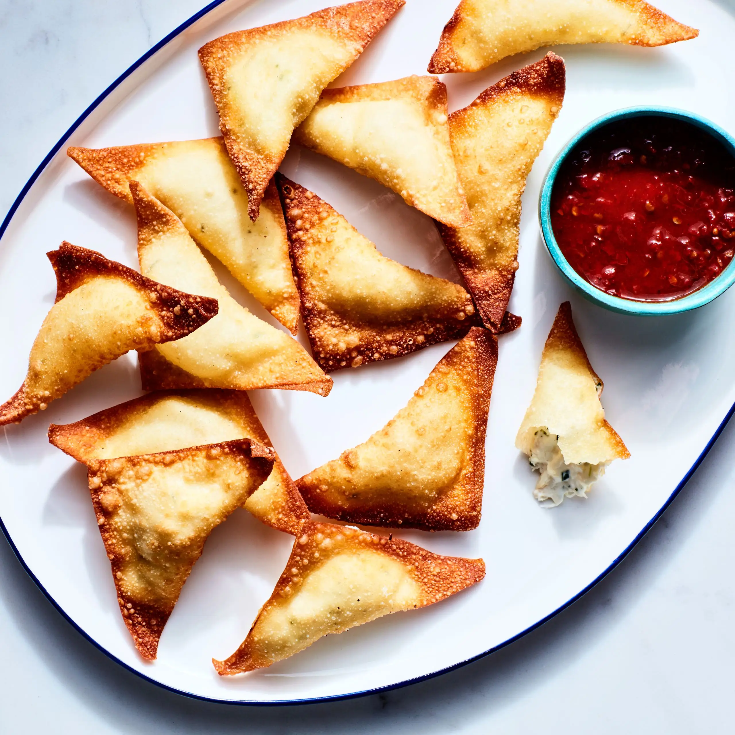 Rangoon de caranguejo (creme queijo caranguejo wonton)