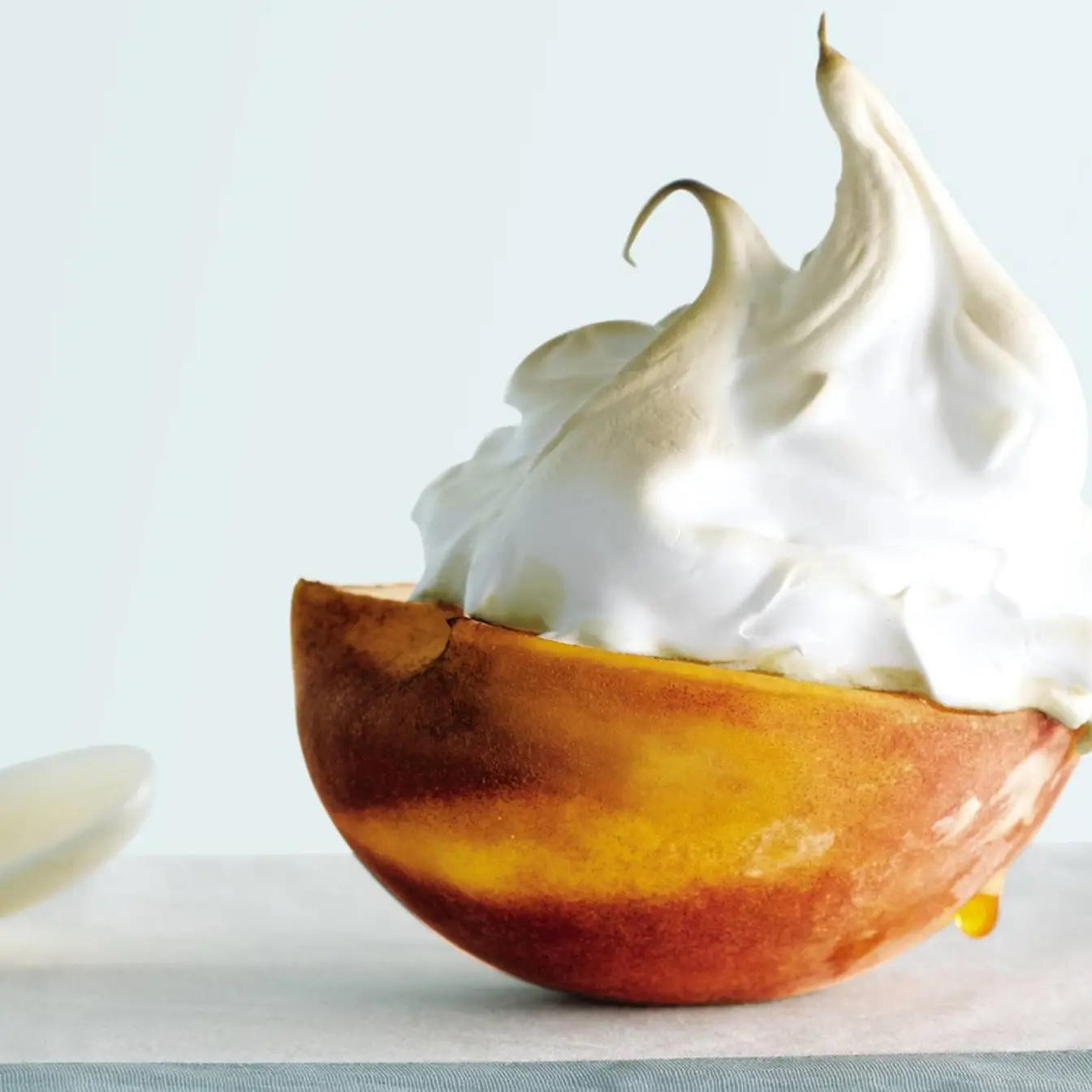 Pêssegos em merengue