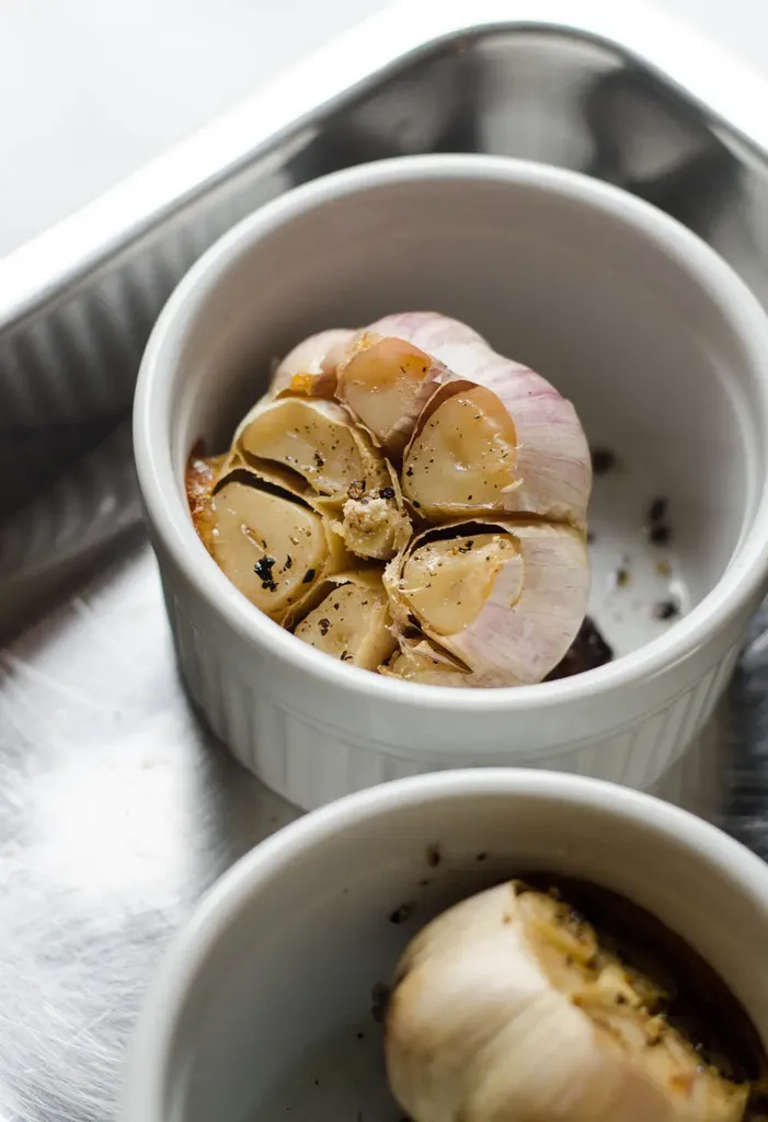 How to Roast Garlic Without Aluminum Foil - Learn how to easily roast garlic without wrapping it in aluminum foil!