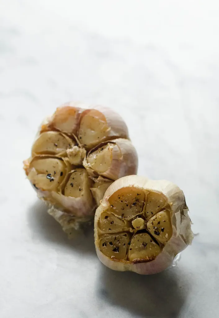 How to Roast Garlic Without Aluminum Foil - Learn how to easily roast garlic without wrapping it in aluminum foil!