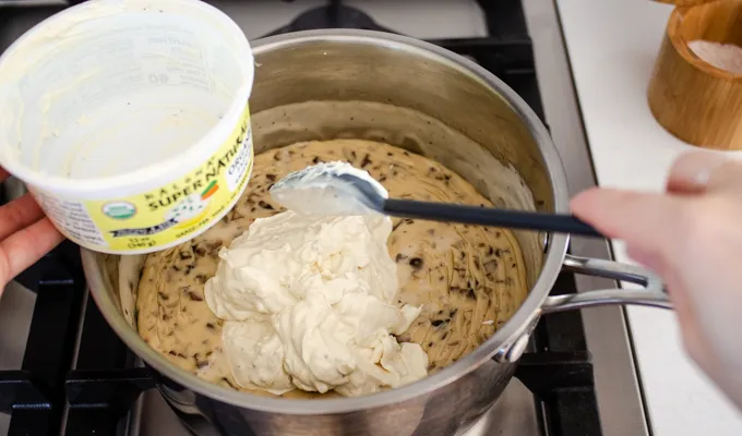 Adding Kalona SuperNatural French Onion Dip to the soup base.' title='Gluten Free Cheesy Potatoes