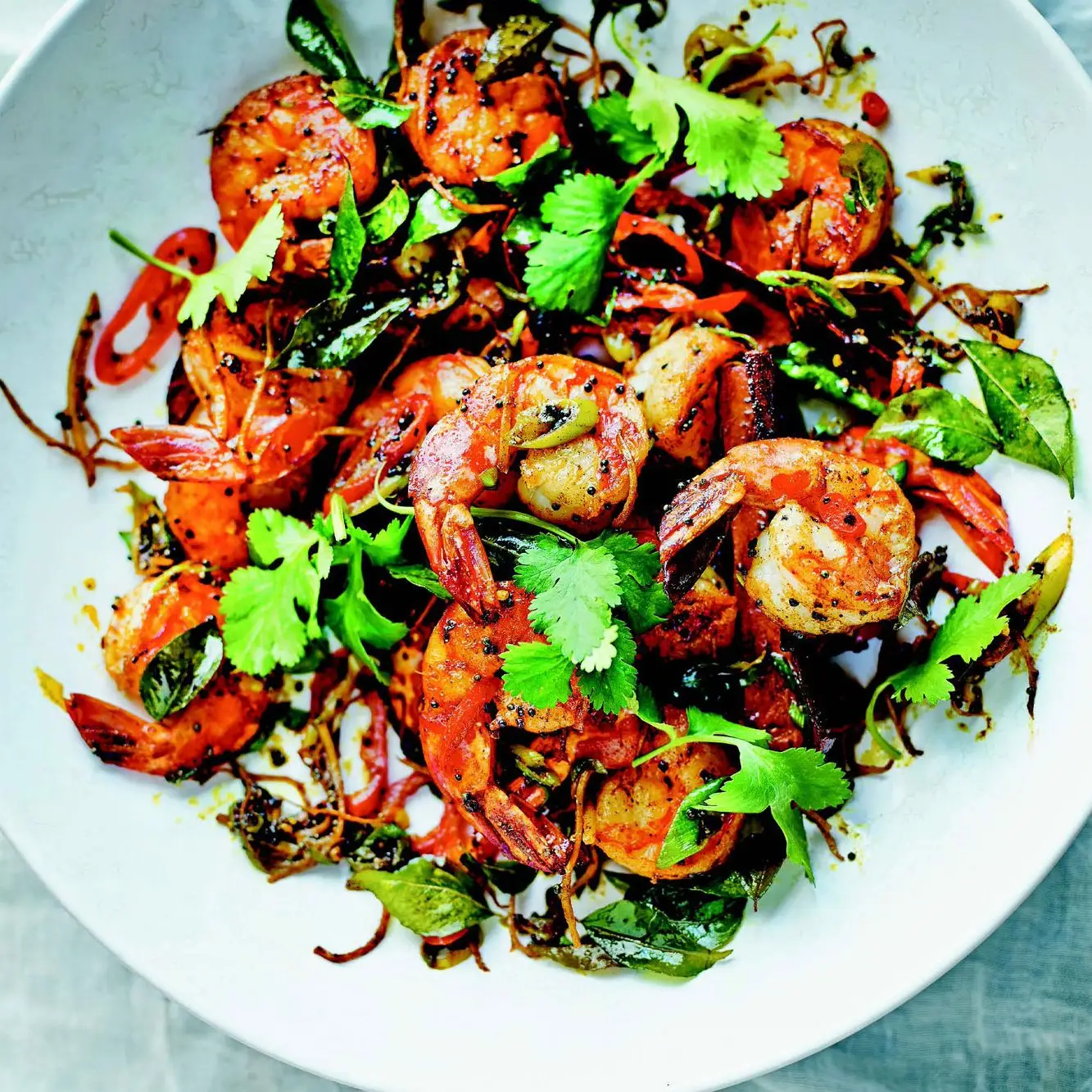 Camarão de tigre com limão, gengibre e sementes de mostarda