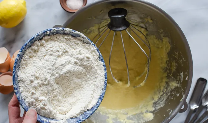 Adding the flour mixture to the batter.' title='Sour Cream Pound Cake Loaf
