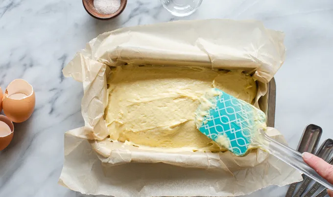 Spreading the batter out in the pan.' title='Sour Cream Pound Cake Loaf