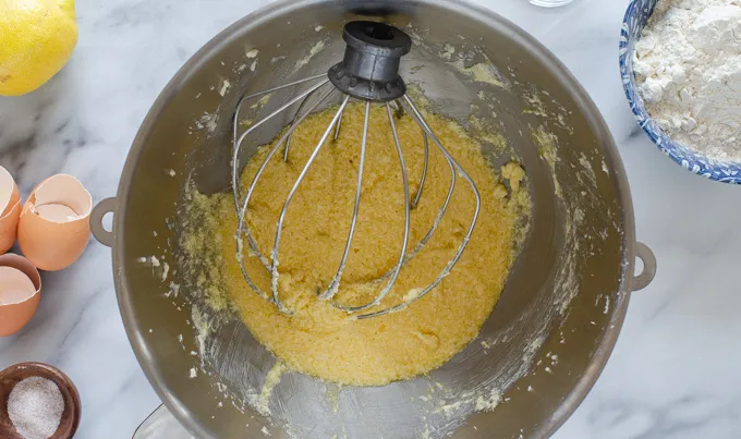 Adding the eggs and vanilla.' title='Sour Cream Pound Cake Loaf