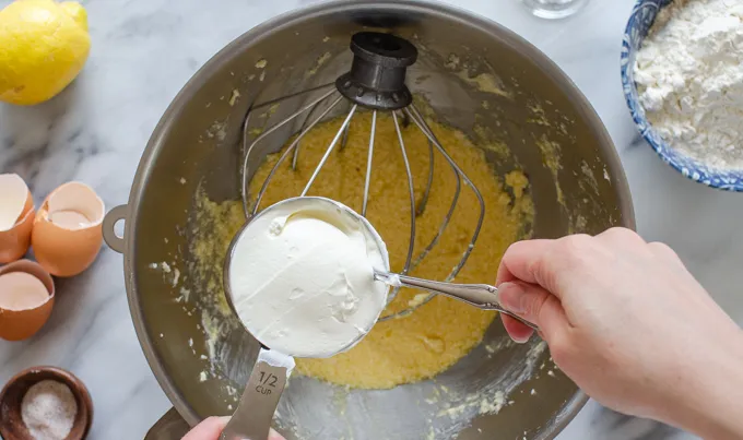 Adding the sour cream to the batter.' title='Sour Cream Pound Cake Loaf