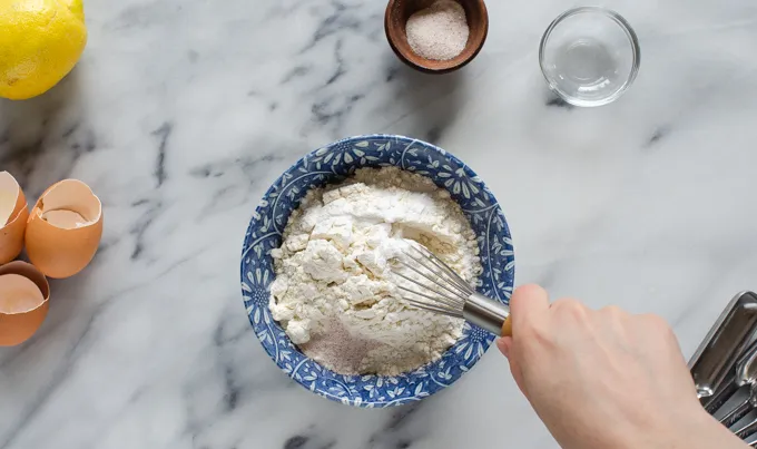 Whisking the dry ingredients together for a sour cream pound cake loaf.' title='Sour Cream Pound Cake Loaf