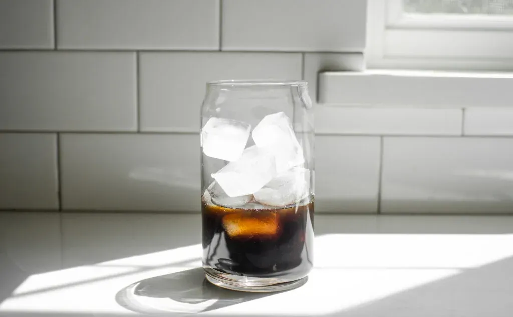 Adding ice on top of the boba pearls in the glass.' title='How to Make Matcha Milk Tea with Boba