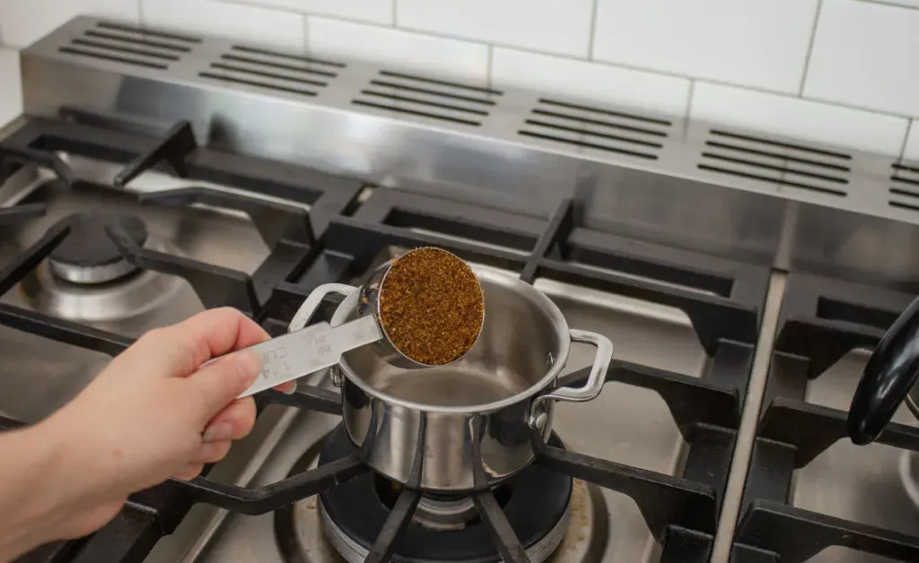 Adding the dark brown sugar to a small saucepan.' title='How to Make Matcha Milk Tea with Boba