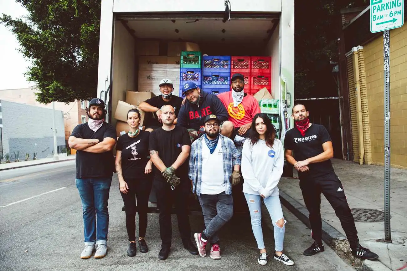 The No Us Without You LA team packs up a truck with donations for undocumented hospitality workers. 