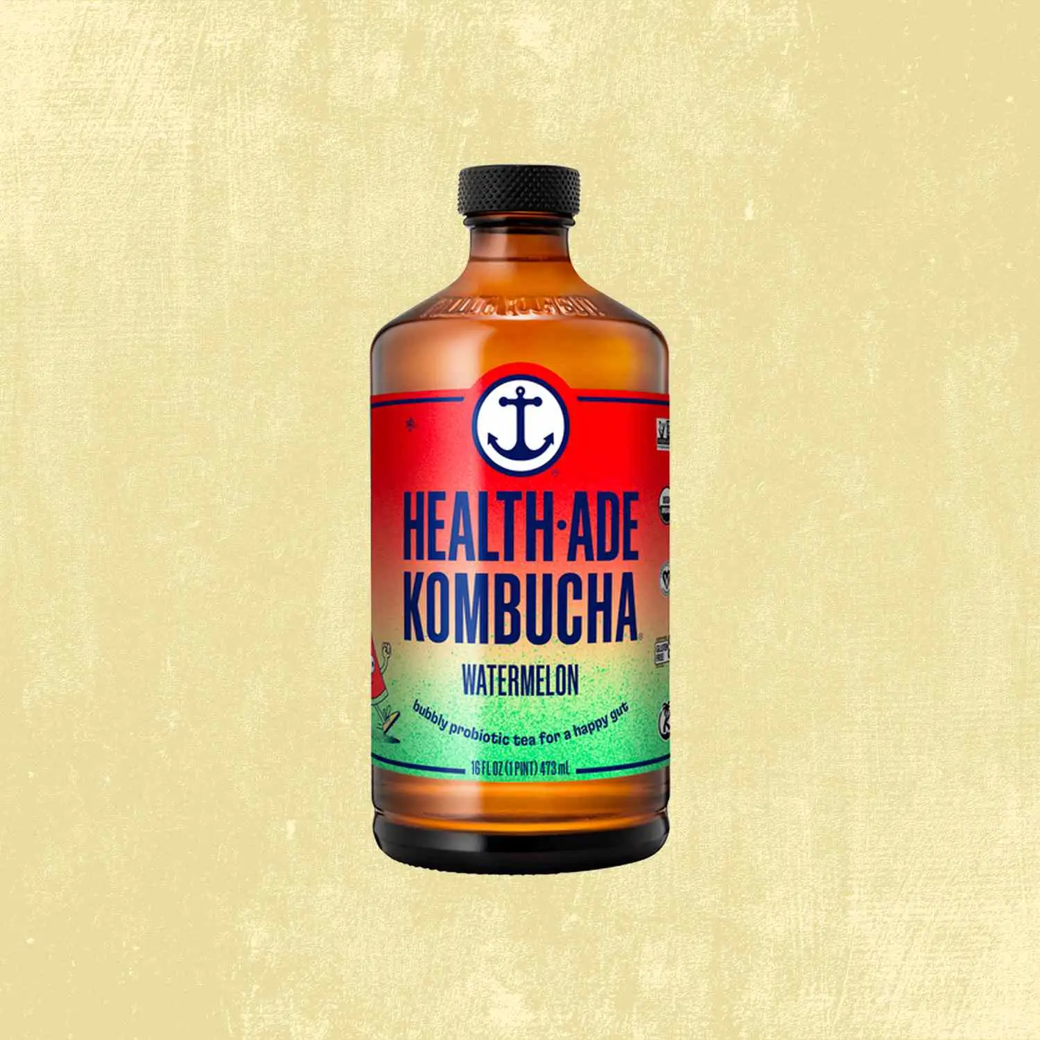 Health Ade Watermelon Kombucha against tan background