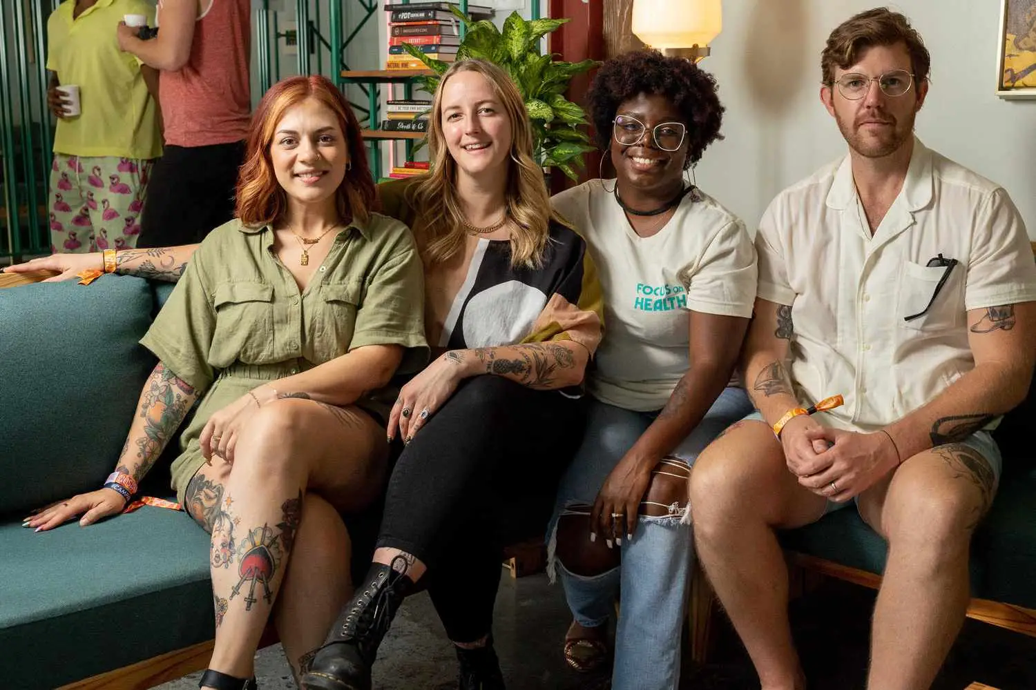 Team of Focus on Health seated and smiling