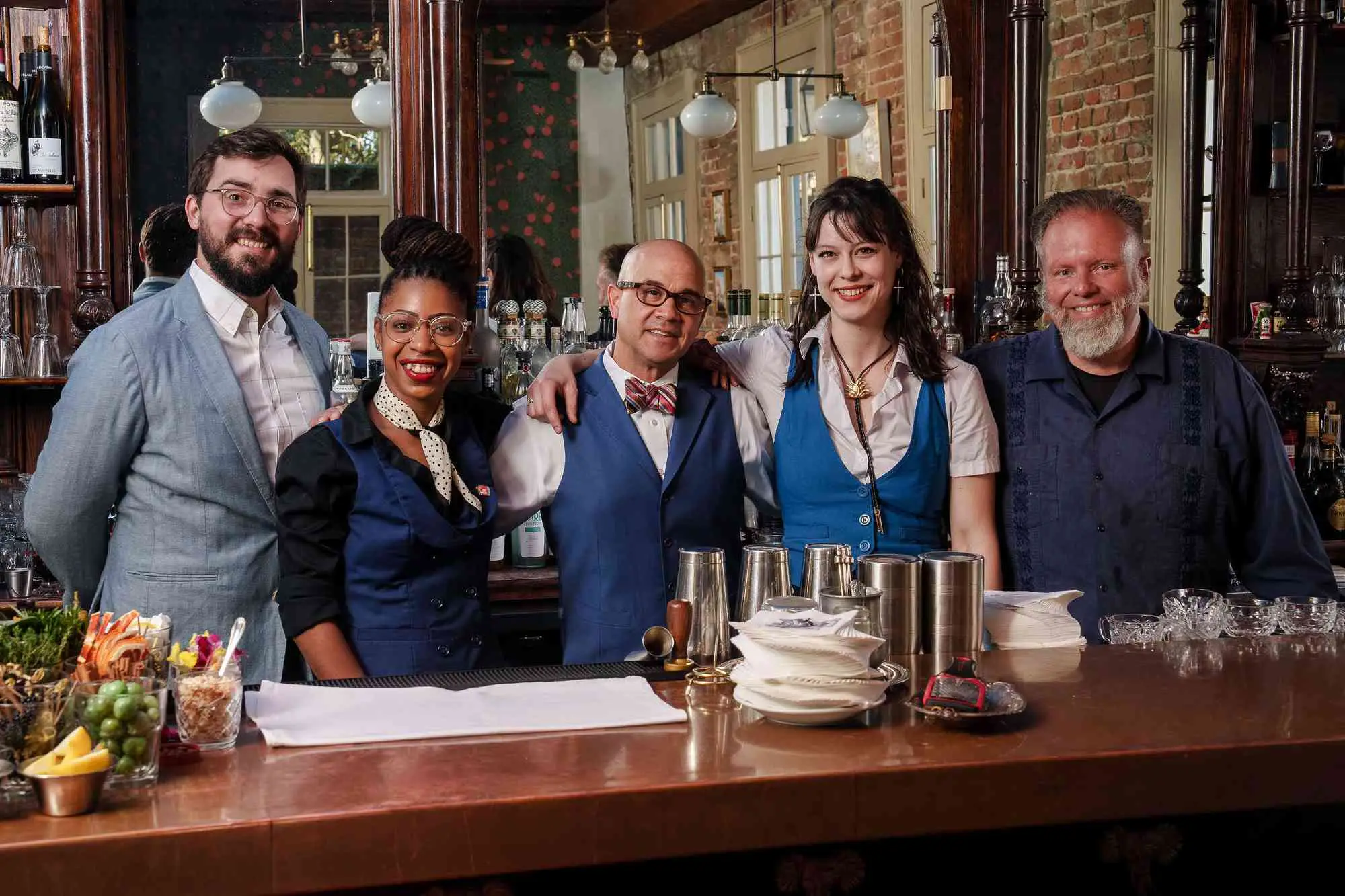 Bar staff of Jewel of the South behind bar 