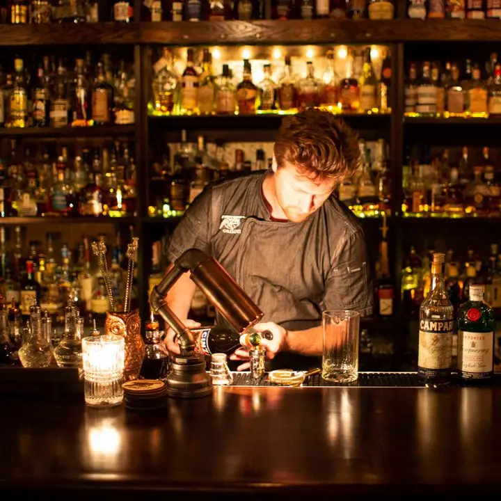 A bartender makes a Negroni with vintage sweet vermouth. 