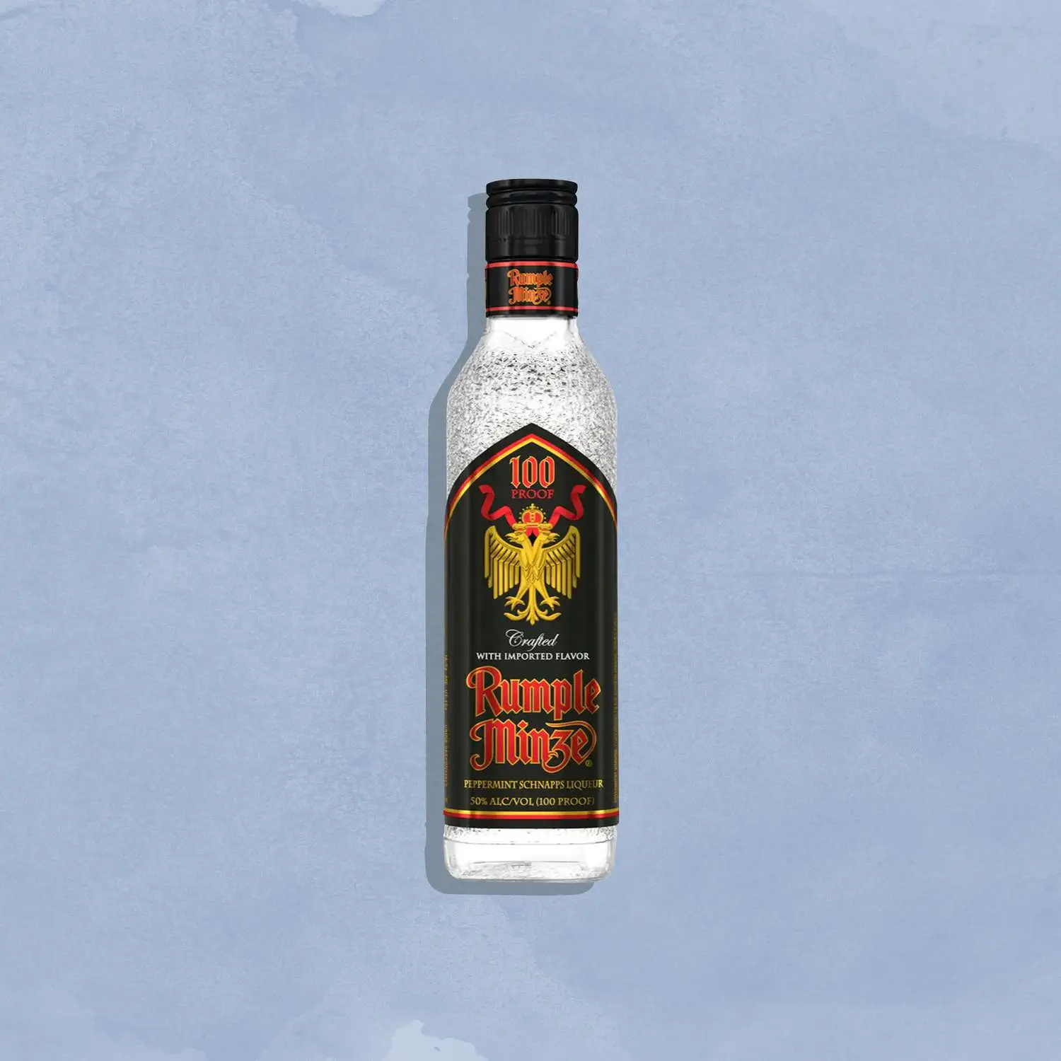 Rumple Minz bottle against blue background