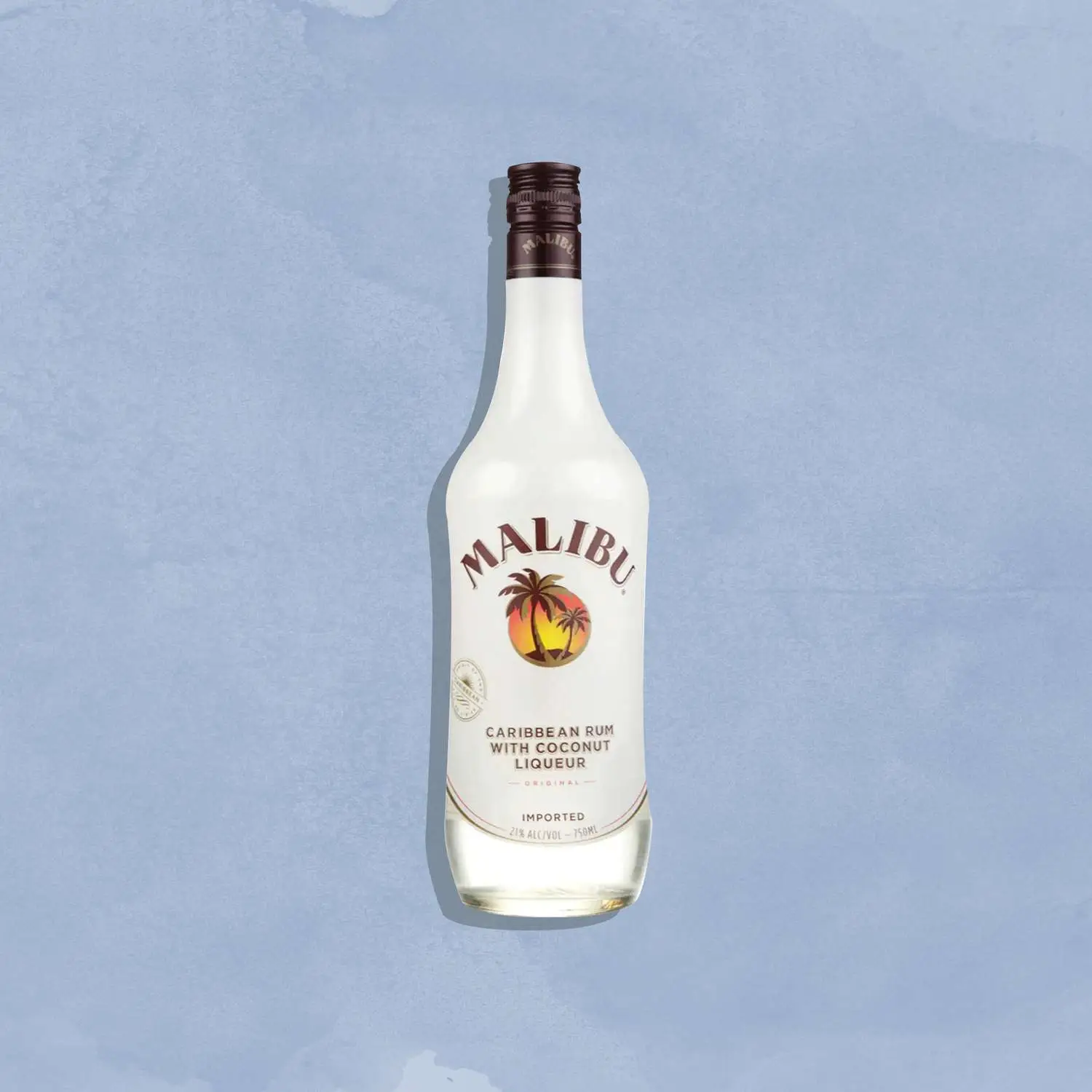 Malibu bottle against blue background
