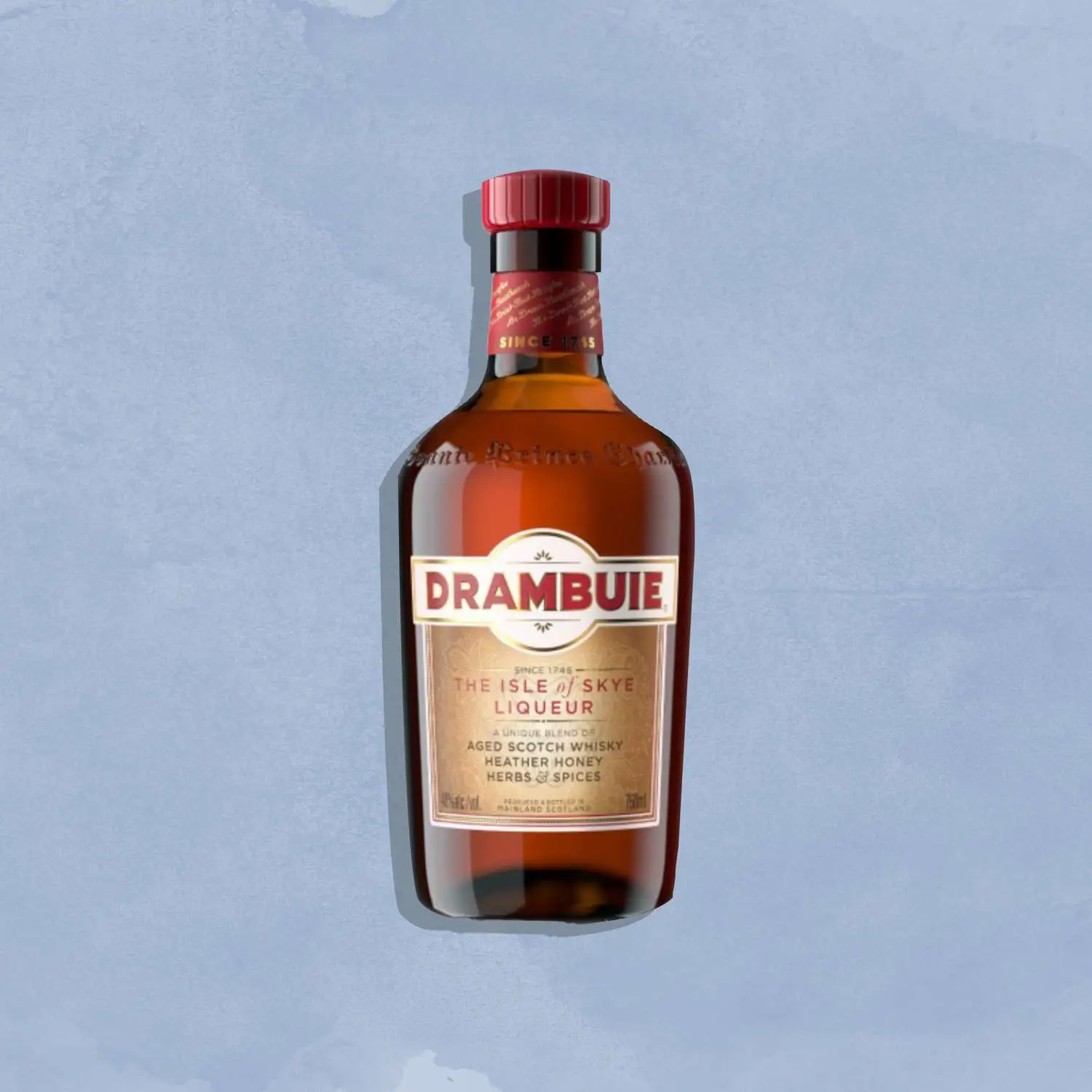 Drambuie bottle against blue background