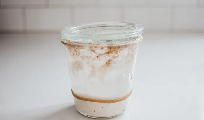 A crusty jar of sourdough starter that needs to be cleaned.' title='How to Make a Sourdough Starter From Scratch